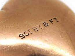 Hallmarking signs on 9ct back and front piece